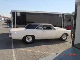white chevelle with black rag top