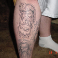 upper leg tattoo