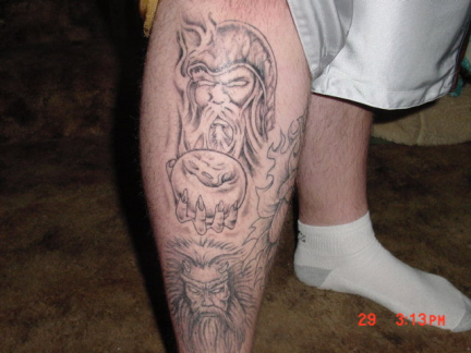 upper leg tattoo